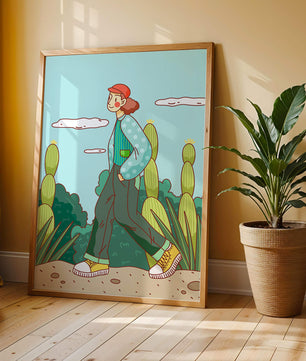 Person walking in desert landscape with cacti