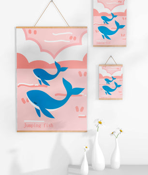 Playful whales illustration in pastel pink and blue