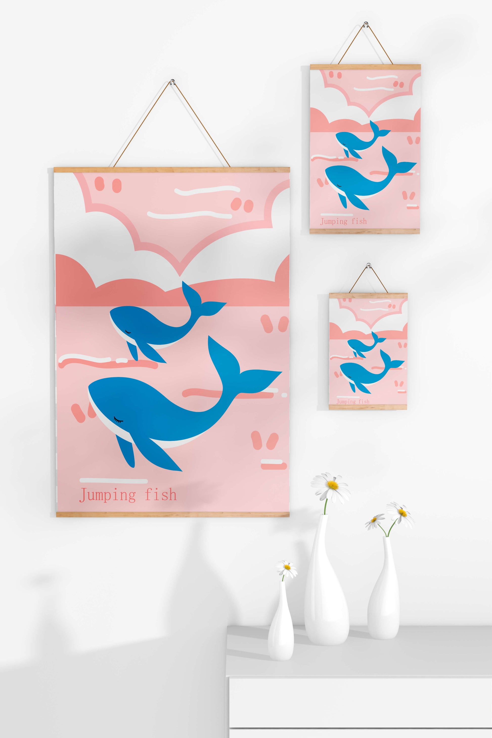 Playful whales illustration in pastel pink and blue