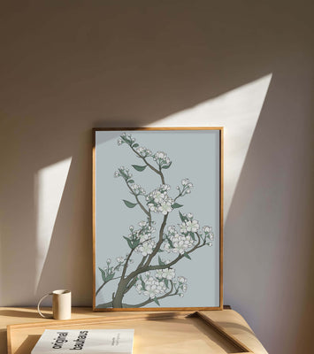 Delicate cherry blossoms on a soft blue background