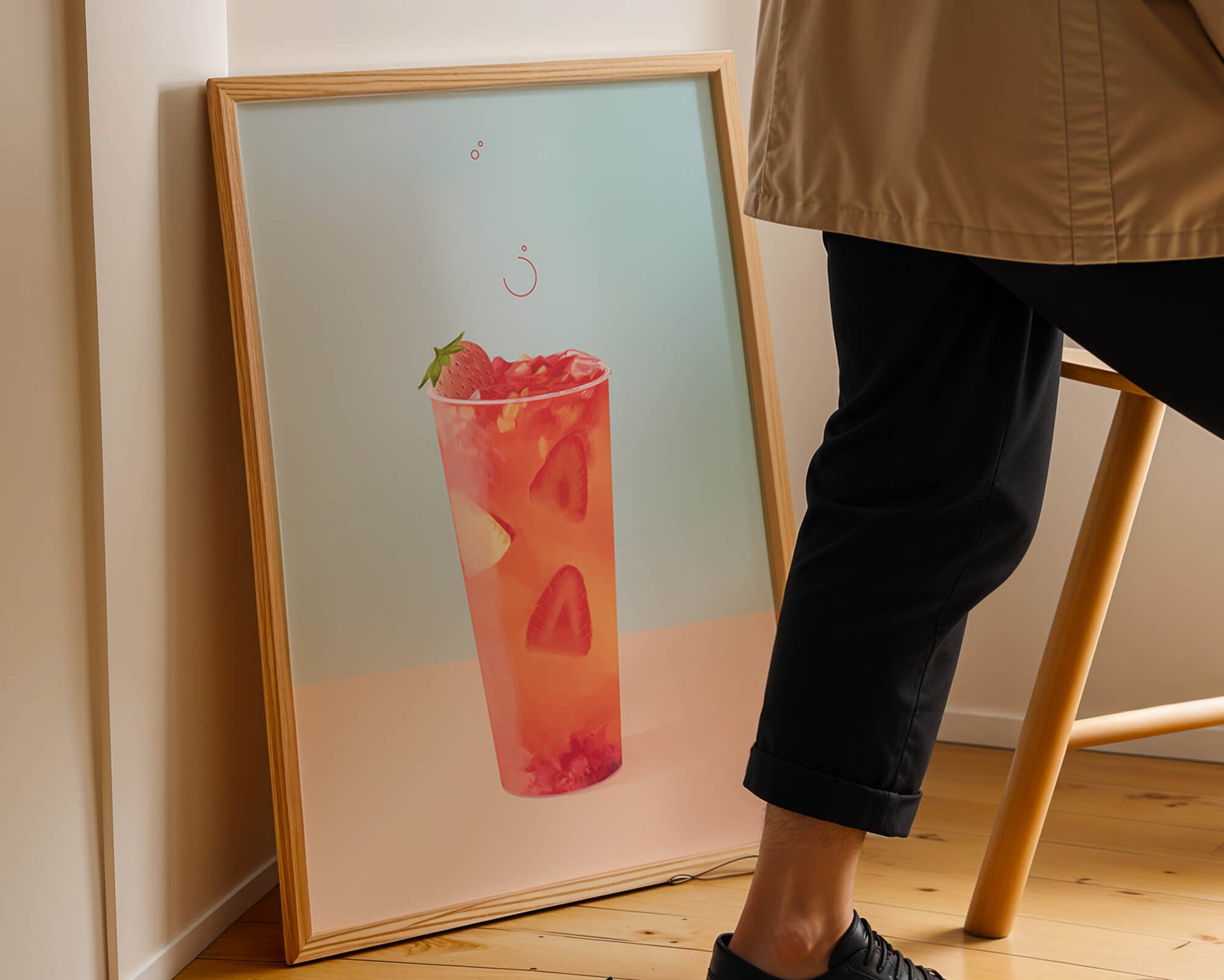 Refreshing strawberry drink with floating slices on pastel background