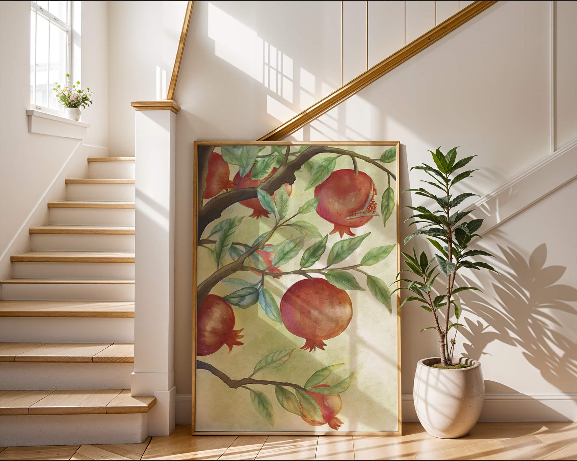 Watercolor illustration of pomegranates on a branch with leaves