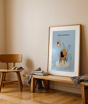 Charming Cat Relaxing on a Chair with Inspirational Quote and Art