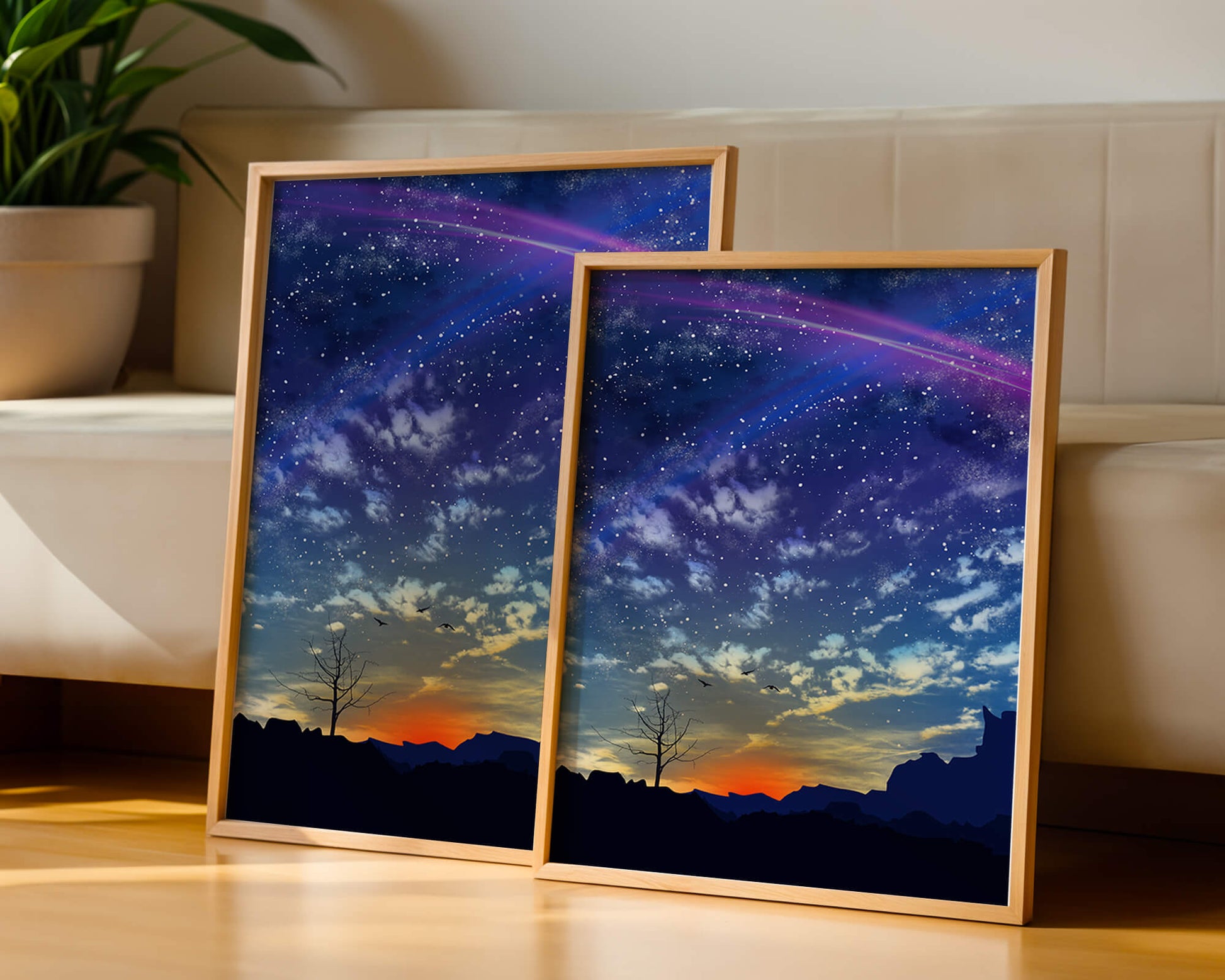 Starlit night sky with colorful sunset and silhouetted landscape