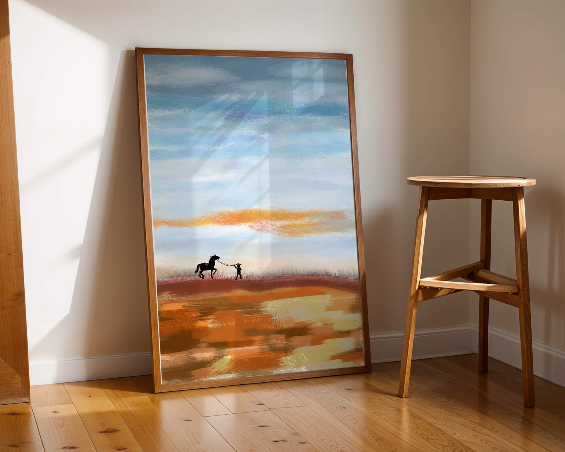 Serene landscape with cowboy and horse under vast sky