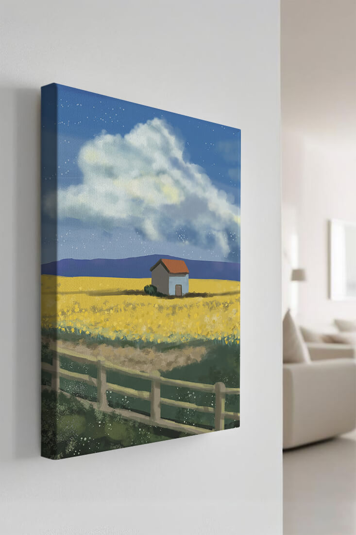 Idyllic rural scene with house and yellow field under blue sky