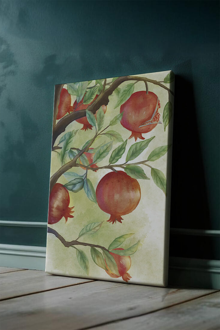 Watercolor illustration of pomegranates on a branch with leaves