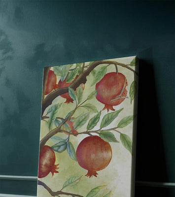 Watercolor illustration of pomegranates on a branch with leaves