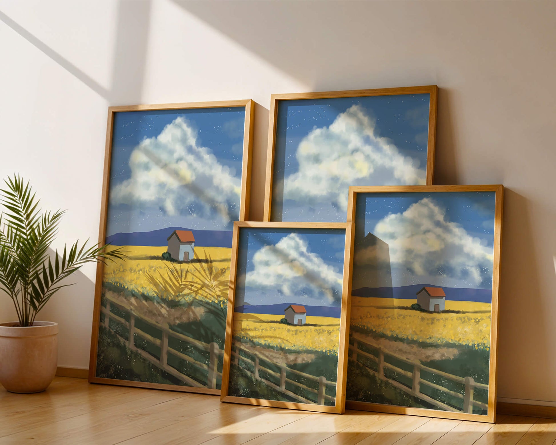 Idyllic rural scene with house and yellow field under blue sky