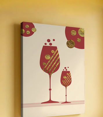 Stylish wine glasses with gold accents and a festive theme