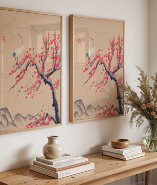 Elegant crane on cherry blossom tree with mountainous background