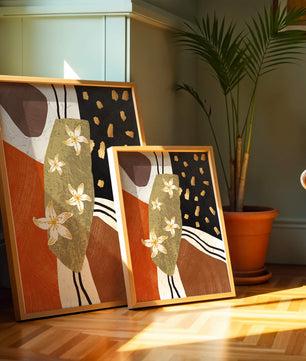 Abstract floral artwork with gold accents and earthy tones
