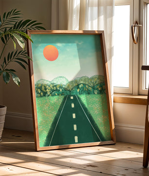 Serene Landscape with Road Leading to Sunset and Lush Greenery