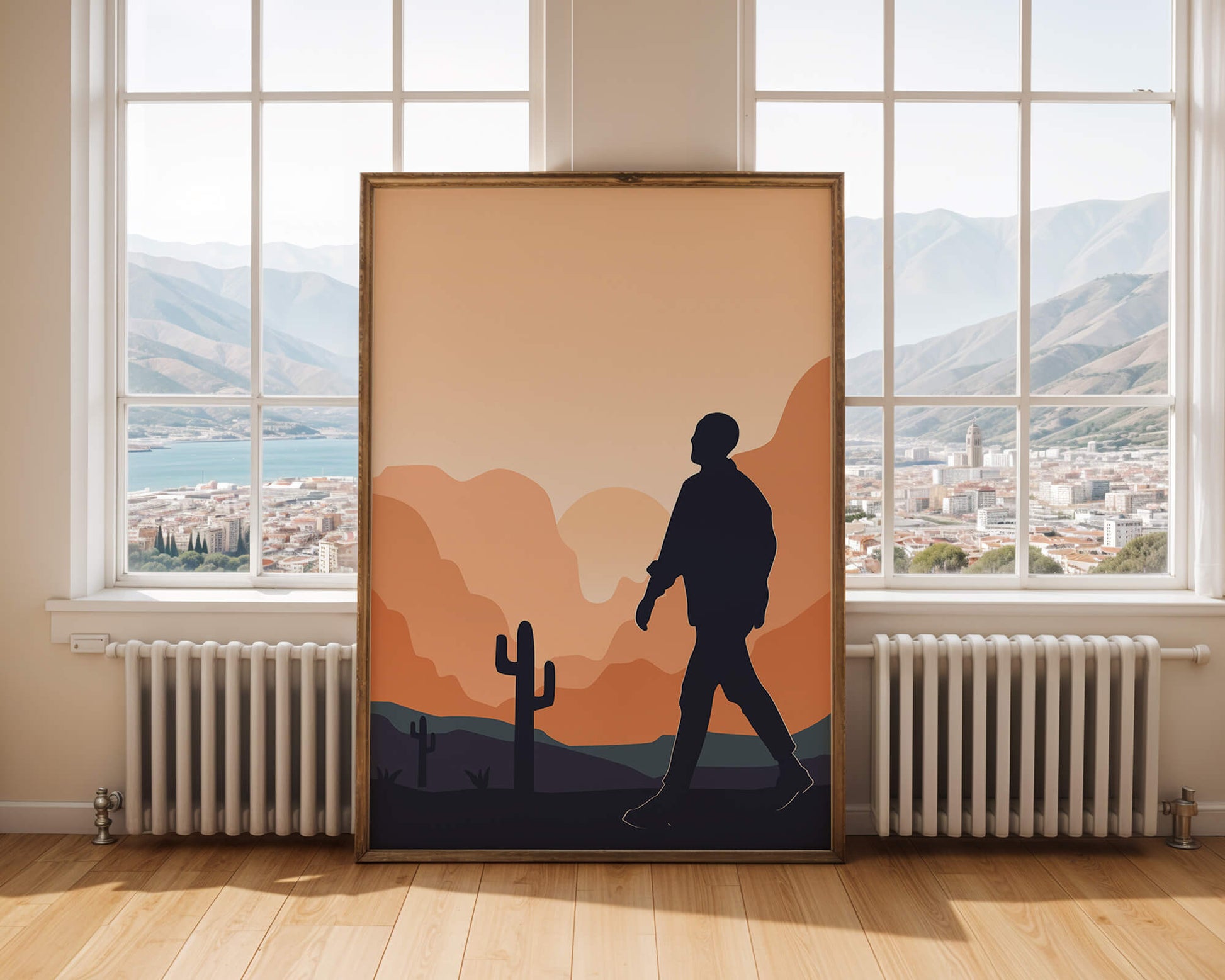 Silhouetted figure walking in desert landscape at sunset