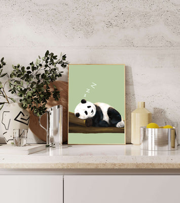 Peaceful panda resting on a log in a serene setting