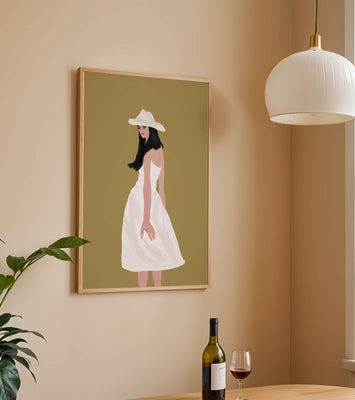 Woman in a white dress and hat on a gold background