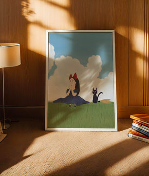 Niña con lazo rojo y gato en un prado verde exuberante