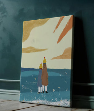 Two figures in winter clothing on a serene beach