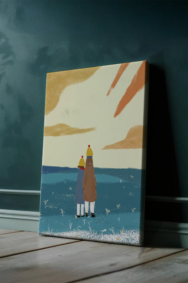 Two figures in winter clothing on a serene beach