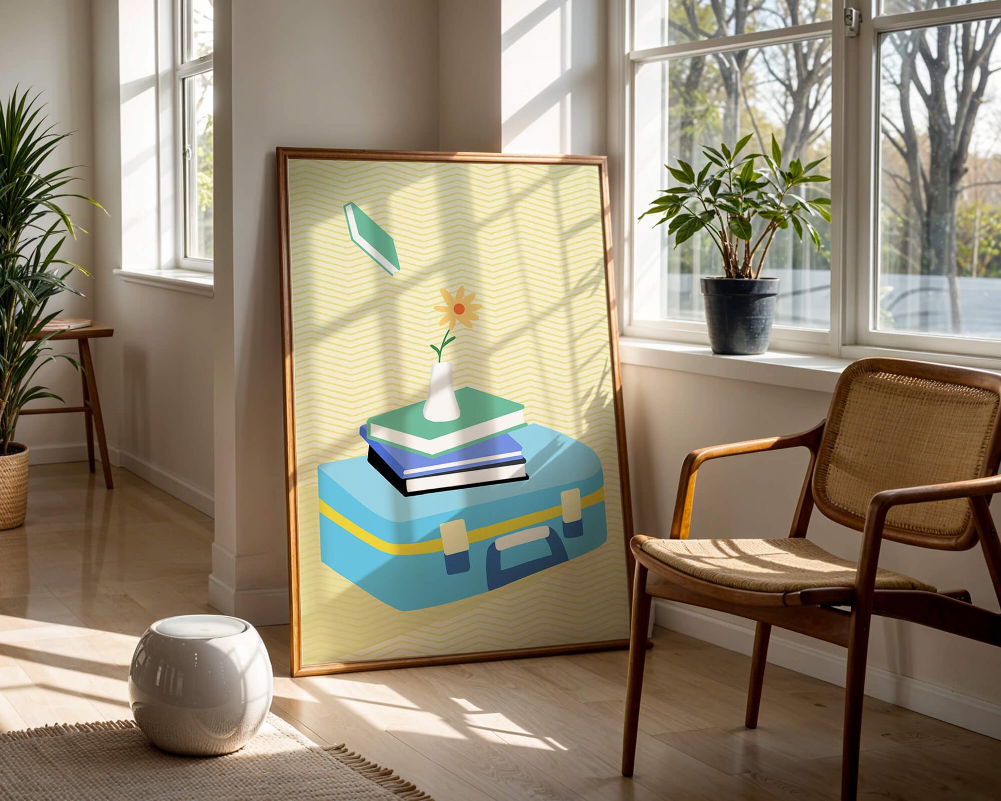 Colorful still life with books, flower vase, and suitcase