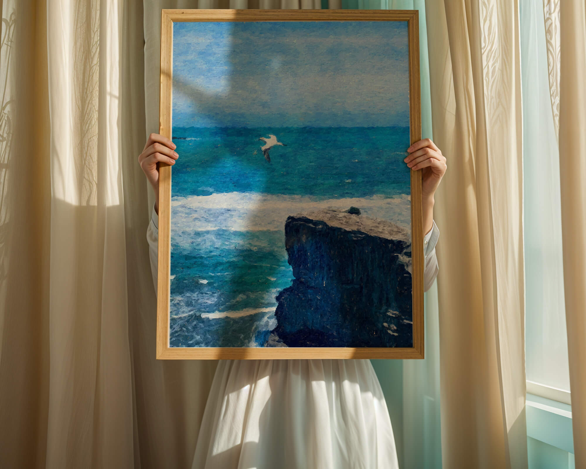 Seascape with soaring seagull over rocky cliff and ocean waves