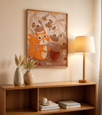 Orange Squirrel with Acorn in Autumn Forest