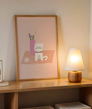 Illustration of a cute white cat with a pink vase and yarn ball on a pastel background