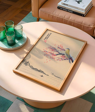 Traditional Chinese painting with bird and blossom branch over tranquil landscape