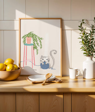 Cat Playing with Yarn Beside a Potted Plant on Pink Stool - Mi tienda