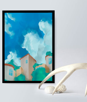 Serene landscape with houses and fluffy clouds against a blue sky