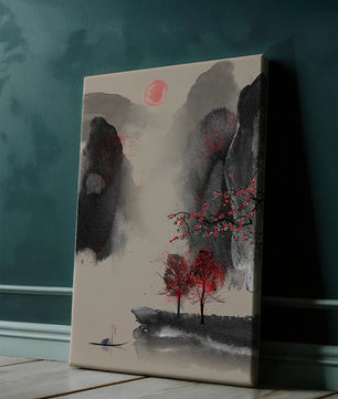 Serene landscape with red foliage and misty mountains