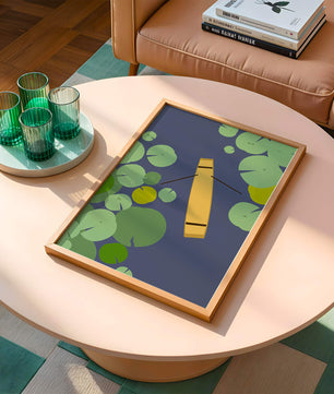 Top view of a yellow canoe among green lily pads on a calm lake