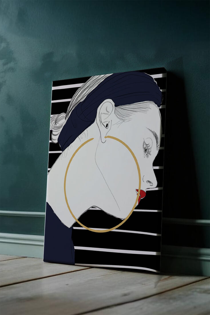Profile of woman with hoop earrings and striped headscarf