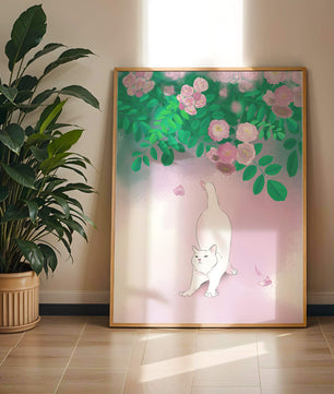 White cat stretching beneath blooming flowers in a pastel garden setting