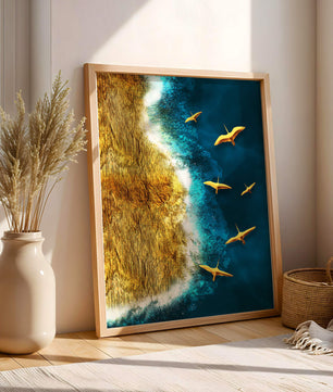 Golden beach landscape with vibrant ocean and flying seabirds