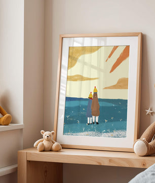 Two figures in winter clothing on a serene beach