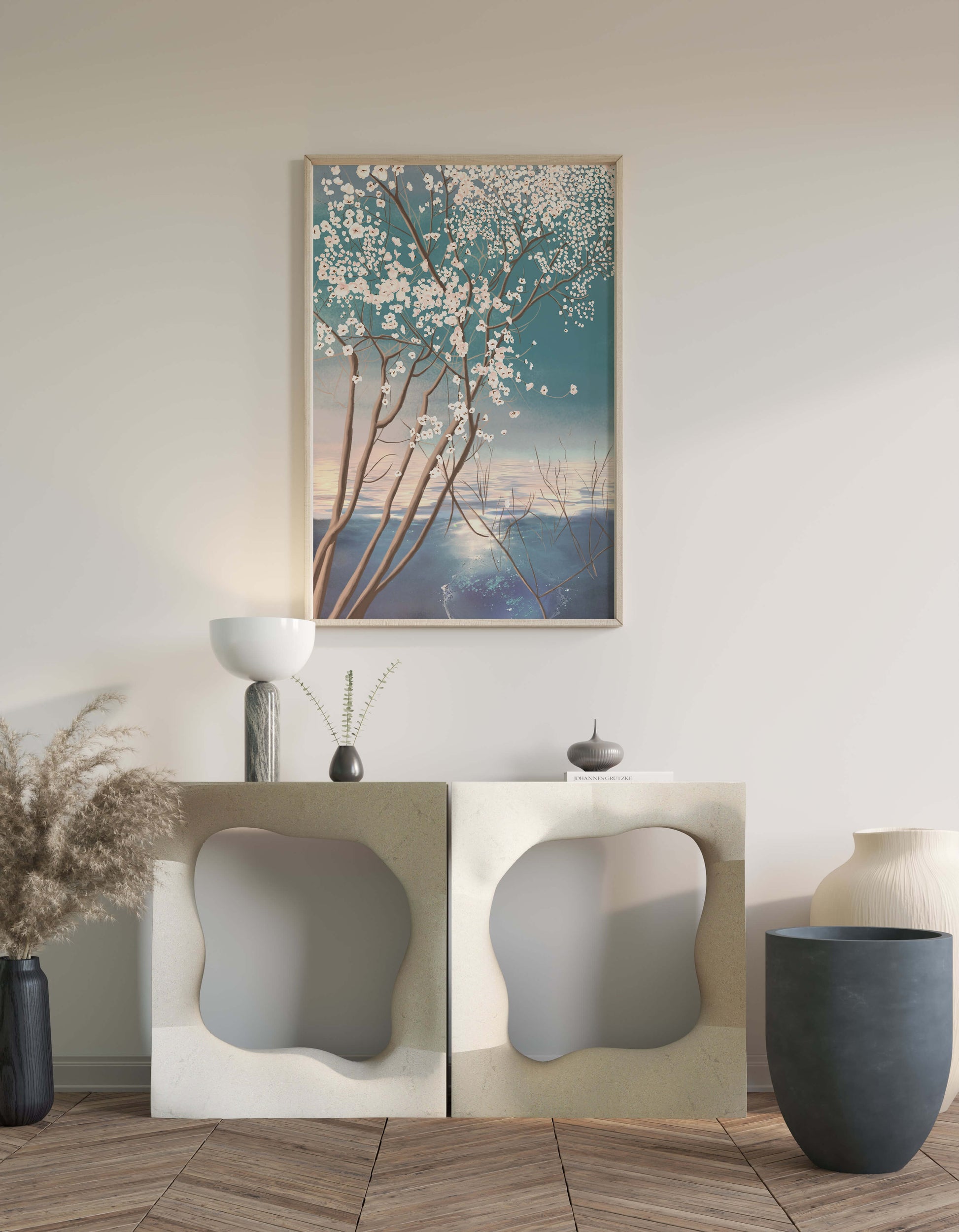 Serene landscape with blossoming tree over calm water reflection