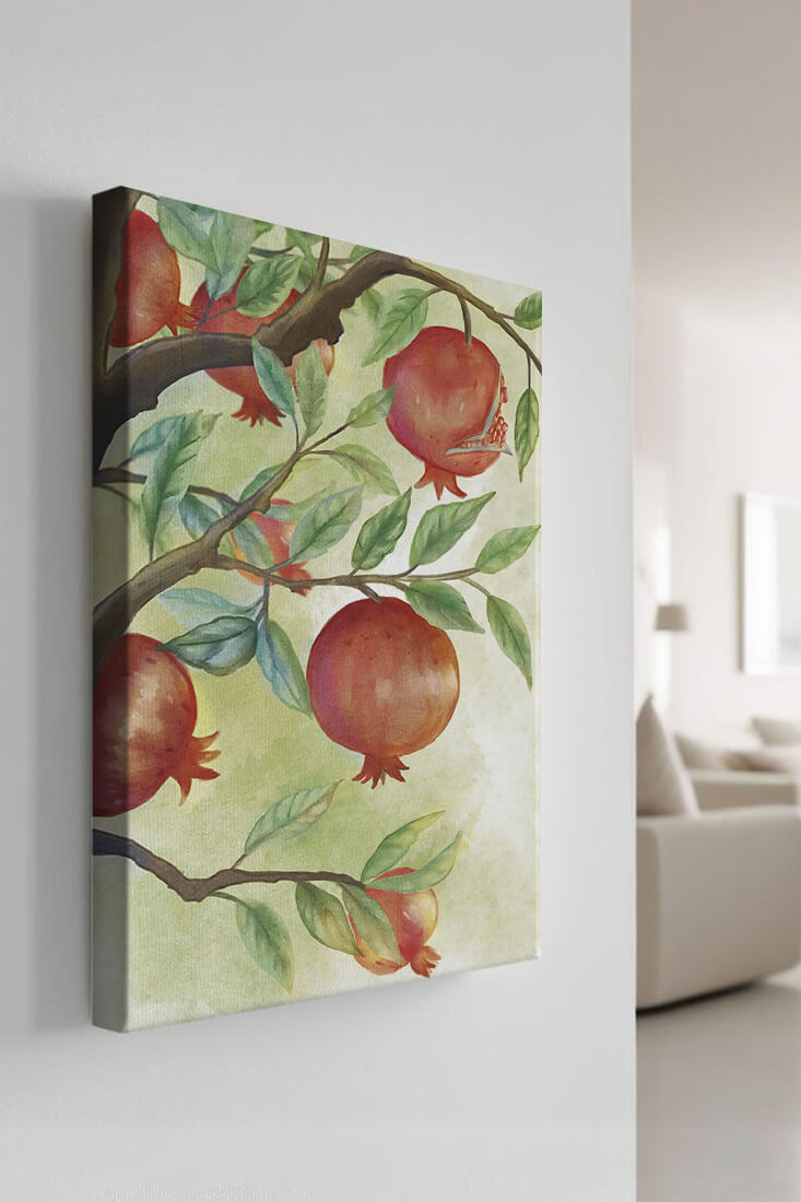 Watercolor illustration of pomegranates on a branch with leaves