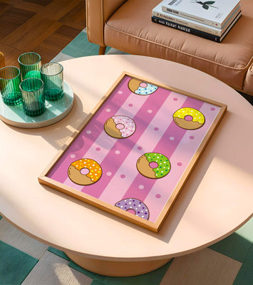 Colorful donut pattern on pink striped background