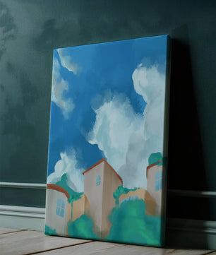 Serene landscape with houses and fluffy clouds against a blue sky