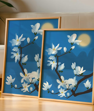 White magnolia branch under moonlight with blue background