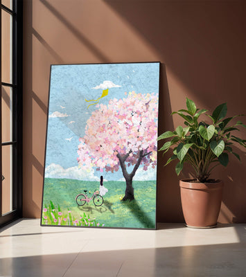 Springtime scene with cherry blossom and girl with bicycle
