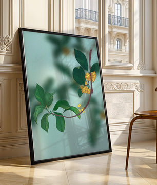 Rama con flores amarillas y hojas verdes sobre un fondo azul claro