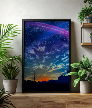 Starlit night sky with colorful sunset and silhouetted landscape