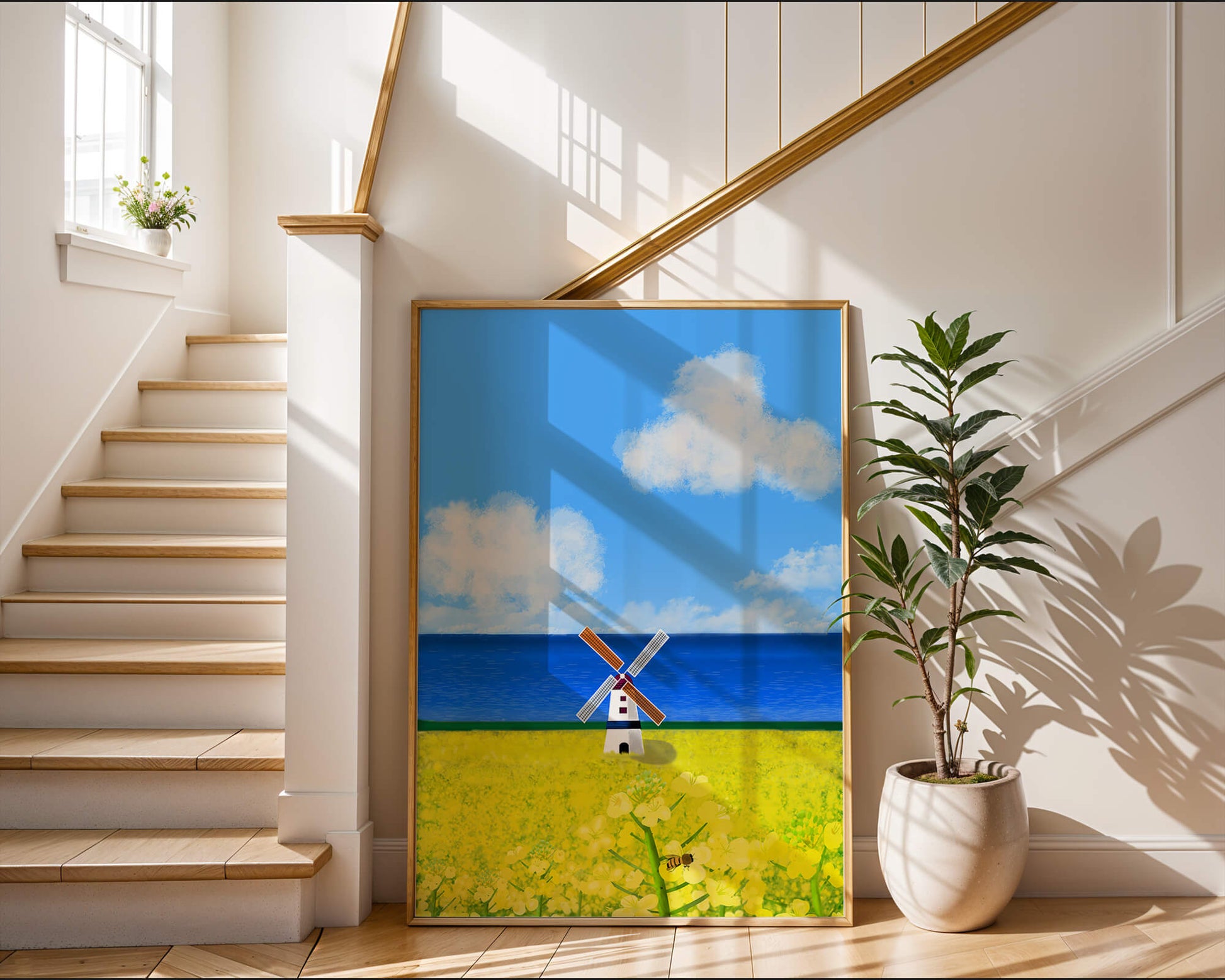 Scenic landscape with windmill in blooming field by the sea