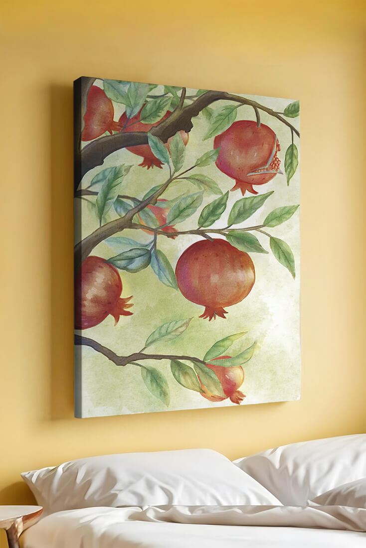 Watercolor illustration of pomegranates on a branch with leaves