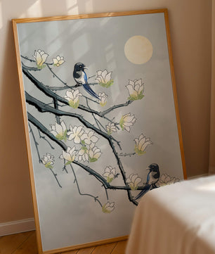 Birds on blossoming branches under a serene moonlit sky
