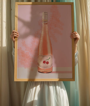 Illustrated wine bottle with a cherry label on pink background