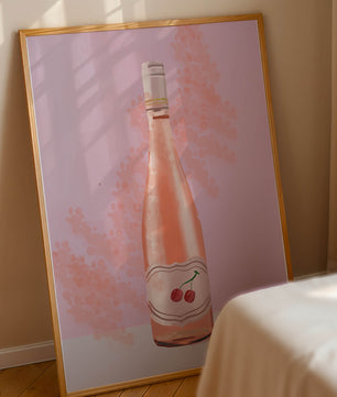 Illustrated wine bottle with a cherry label on pink background