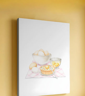 bowl of eggs and quiche on checkered cloth with fork in kitchen setting